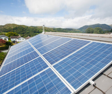 Solar voltaic panels on a house roof in Ambleside, Cumbria, UK.